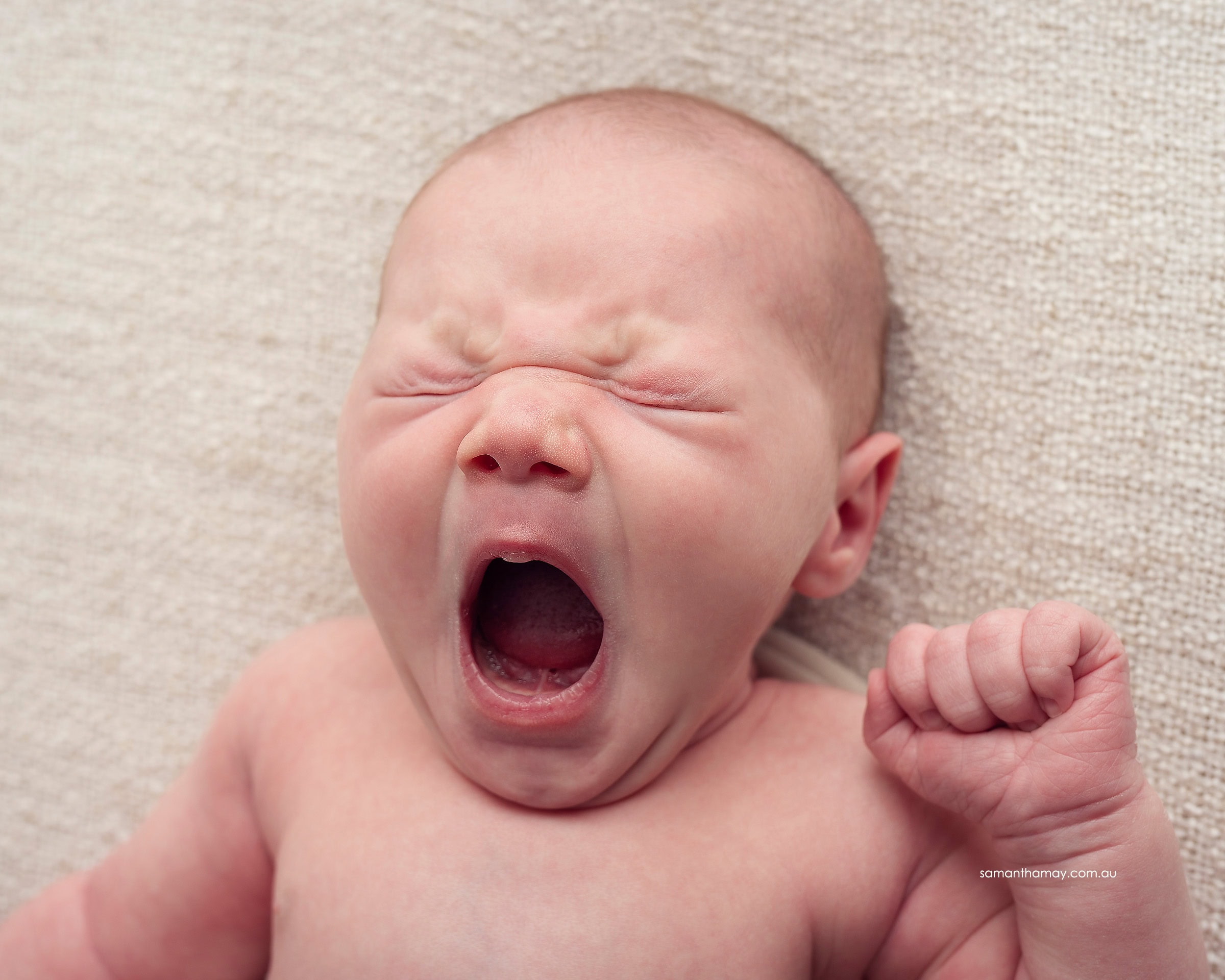 newborn baby yawn